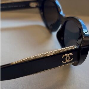 CHANEL Black Sunglasses with Gold Detailing
